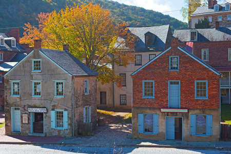 HARPERS FERRY, WEST VIRGNIA, USA â OCTOBER 24, 2017: Shops along a street in the late autumn afternoon in historic town located at the foothill of Appalachian Mountains. The town attracts tourists all year round for its history and natural surroundings.のeditorial素材