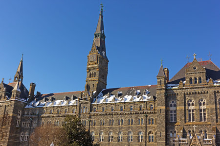 WASHINGTON DC, USA - JANUARY 15, 2019: A facade of Georgetown University Healy Hall building in winter after snowfall.のeditorial素材