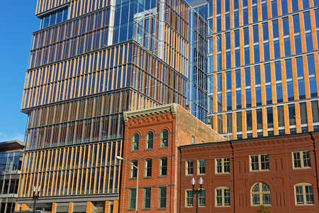 Modern architecture meets historic buildings in downtown of Washington DC, USA. New development transformed the suburbs of US capital.のeditorial素材
