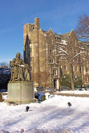 WASHINGTON DC, USA - JANUARY 15, 2019: Georgetown University campus main square with statue of its founder John Carroll on a wintry day after a heavy snowfall.のeditorial素材