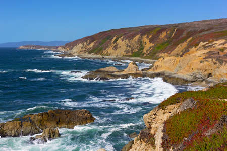 Pacific coastal line of Bodega Bay in California, USA. High waves of rugged shoreline near Bodega Head promontory.の写真素材