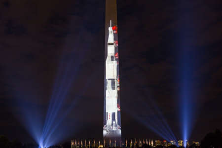 WASHINGTON DC, USA â JULY 17, 2019: US capital event, a projection of Saturn V rocket image on the east side of the Washington Monument to celebrate the 50th anniversary of the Apollo moon landing.のeditorial素材