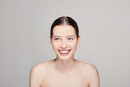 Cosmetology. Skincare. Beautiful girl with natural makeup. Women with clean fresh skin, dark hear...