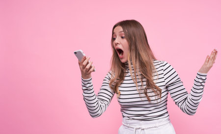 A beautiful young Caucasian girl screamed on the phone, was angry and unhappy with her interlocutor...