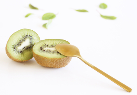 Ripe kiwi fruit isolated on white background, superfood, detox and healthy food.の写真素材