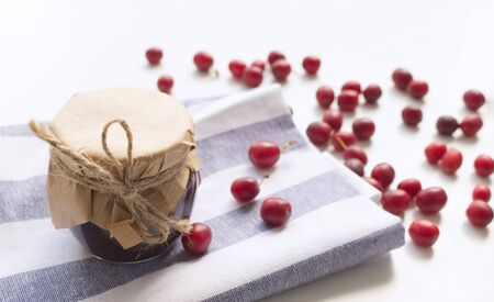 Dogwood marmalade.Cornelian cherry or European cornel is a shrub with red fruits that is also often wild,he is also one of the medicinal plants.の写真素材