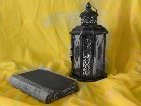 The Muslim feast of the holy month of Ramadan Kareem. Beautiful gold background with a shining...