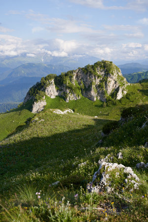 Vertical landscape with isolated rock among a mountain pass.の写真素材