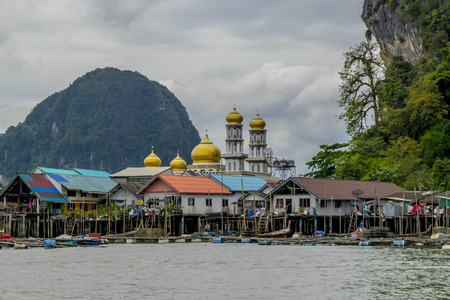 Ko Panyi is a Floating Muslim Village, northeast to Phuket, Thailand. Ko Panyi is a fishing village in Phang Nga Province, Thailand built on stilts by Indonesian fishermen.の写真素材