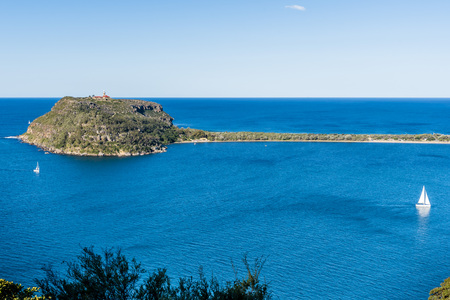 Panoramic daytime view from West Head Lookout to Barrenjoey Headland, Pittwater, Australia. Scenic ocean panorama, peninsula and sailing boats in Sydney North.の写真素材