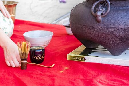 SYDNEY, AUSTRALIA - AUGUST 24: Cherry Blossom Festival on August 24, 2017 in Auburn Botanic Gardens. An unidentified woman performs a Japanese tea ceremony.のeditorial素材