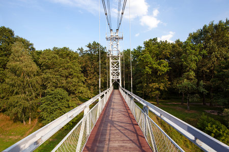 suspension bridge through the river Neman, intended for movement of pedestrians. Belarus, Mostyの写真素材