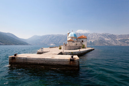the buildings located in the territory of the sea which is near coast of Montenegroの写真素材