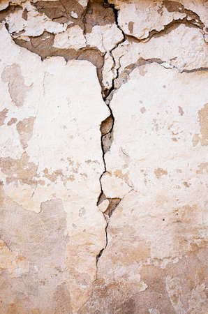 a building wall which started collapsing gradually. old building.の写真素材