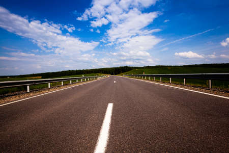 the new asphalted road. summertime of yearの写真素材