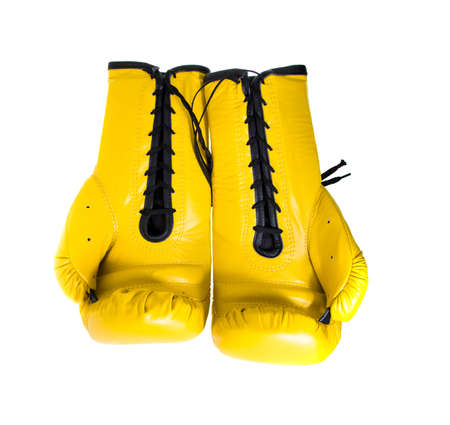 Yellow boxing gloves, isolated on whiteの写真素材