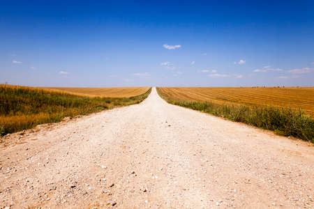 Rural Dirt big road. Belarus. spring season.の写真素材