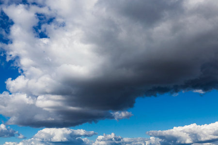 photographed close-up of white clouds in the blue sky are