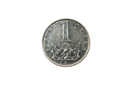 photographed closeup coin in one CZK. Isolated on white