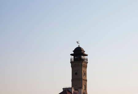 an old fire tower in the city of Grodno, photographed from below against the skyの写真素材