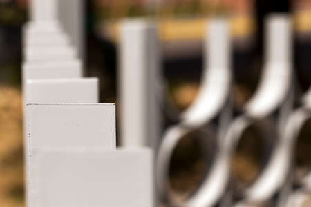 photographed close-up gray metal fence, a small depth of fieldの写真素材