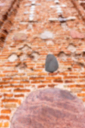 photographed close-up of the old church, crumbling wall, defocused