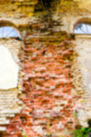 photographed close-up brick wall of an old building, disfocusの写真素材