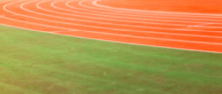 photographed close-up of the old treadmill orange on stadium, Defocusの写真素材