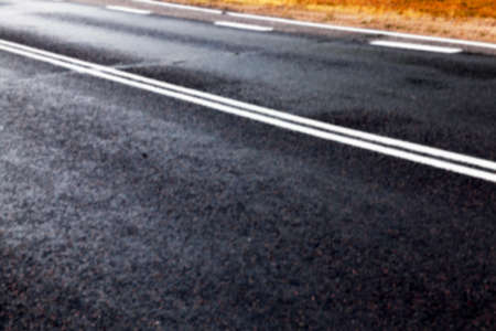 photographed markings on the road, which regulates the movement of participants, defocusの写真素材