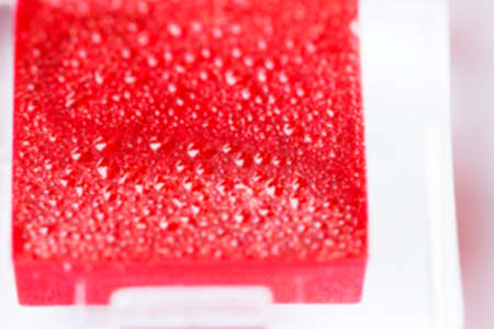 photographed close-up cosmetics female red lip, defocused, defocusの写真素材