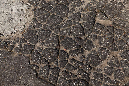 photographed close-up part of the road on which the broken cover - asphaltの写真素材