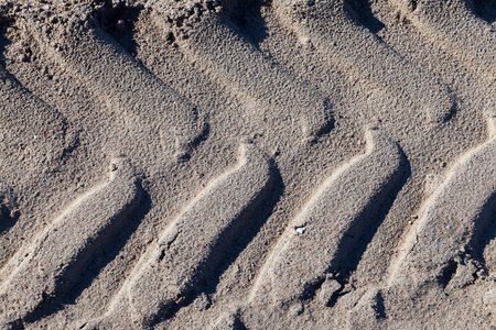 photographed close up traces of the truck, the remaining dried and not sand, shallow depth of field
