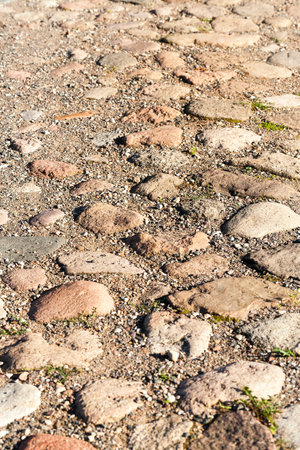 a structure for movement made of stones and boulders. The road, photographed close-up. Small depth of field. Location - Republic of Belarusの写真素材