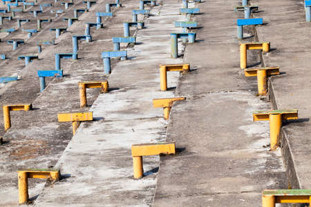 metal structures for fastening and installation of benches in the sports stadium. Photo closeupの写真素材