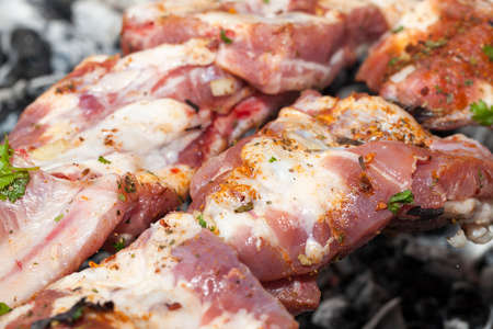 cooking on the grill meat shashlik. Photo close-up with a shallow depth of fieldの写真素材