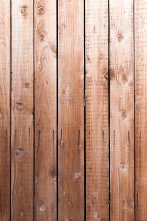 wooden wall, nailed. From nails down drains rust. Photo detail structure close-up.の写真素材