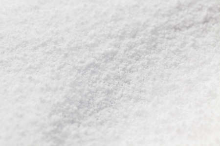 the territory covered with snow in the winter season. Photo taken in close-upの写真素材