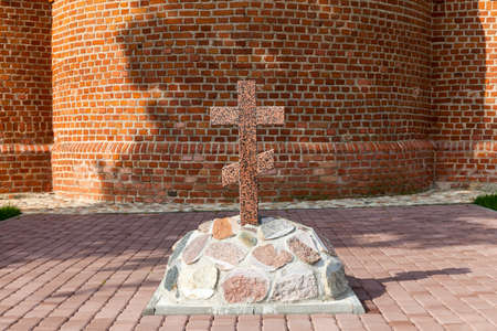 close-up photographed Christian stone cross near the orthodox churchの写真素材