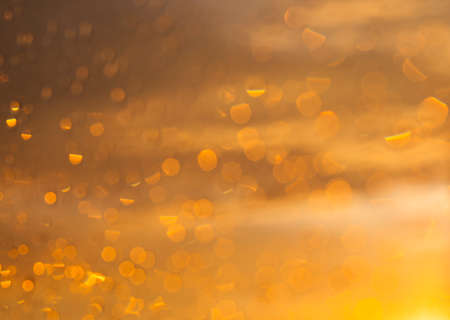 glare from drops of water on the glass from the best sun during sunsetの写真素材