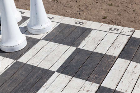 chessboard and pieces of huge chess white in the People's Commissar, used by guests for recreation and play or as a tourist attractionの写真素材