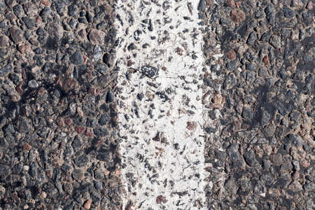 asphalt road and white dividing strip closeup, roadの写真素材