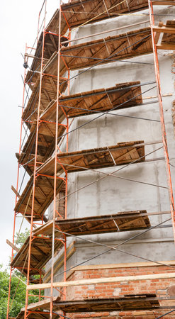 part of the construction of an ancient building in ruins, a close-up of the reconstruction of an...