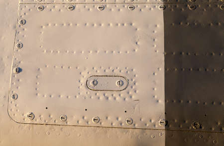 metal rivets of different colors, part of the aircraft, rivetedの写真素材