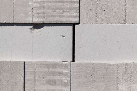 folded together large blocks of white or gray, used in constructionの写真素材