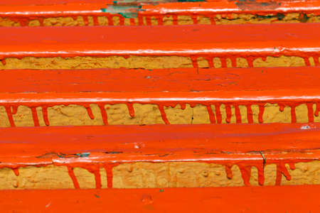 badly painted board benches for outdoor recreation, close-up of wooden construction in the parkの写真素材