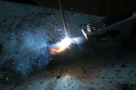 old garage with old tools in which the metal construction is welded,の写真素材