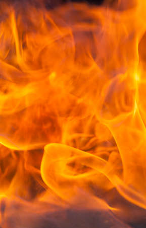 chaotic orange flames, out of focus close up in a fireの写真素材