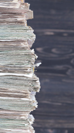 a lot of paper cash lays together in a big pile