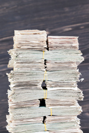 a lot of paper cash lays together in a big pile