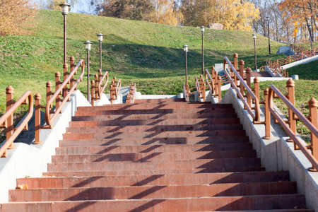 Old staircase on the hill for the convenience of climbing up in the city parkの写真素材